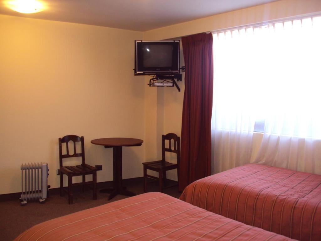 Mosoq Inn Puno Chambre photo